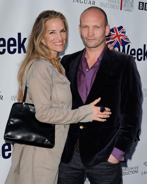 Andrew posing with his wife Sarah